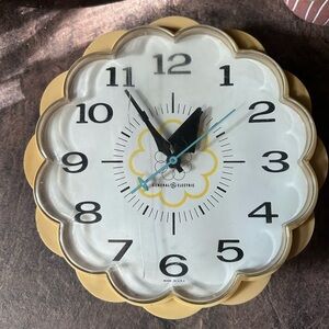 GE flower wall clock